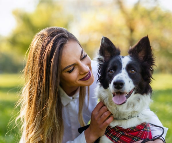 Happy lady with her happy pet